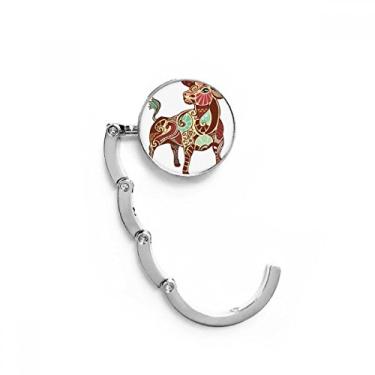Imagem de Gancho de mesa com símbolo do zodíaco da Constelação Taurus Gancho de mesa com fecho decorativo dobrável
