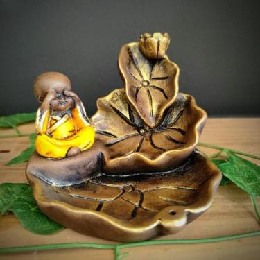Imagem de Porta incenso cascata folhas com buda amarelo 12cm - CASA FÉ