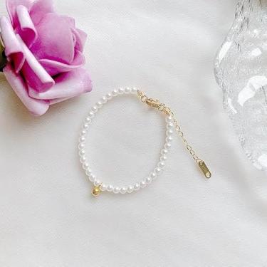 Imagem de Elegante tornozeleira branca com contas elásticas para mulheres, minimalista, ouro, aço inoxidável, corrente de pérolas falsas, decoração de pés, joias de praia de luxo, presente de verão