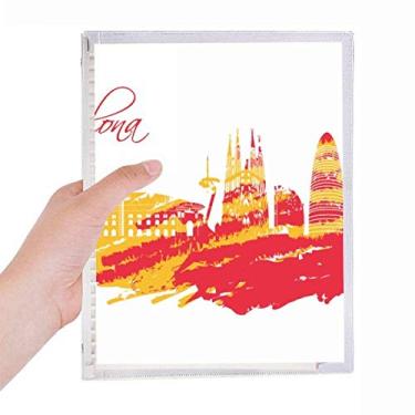 Imagem de Caderno de Barcelona com desenho de cidade, vermelho, amarelo, folhas soltas, diário recarregável, papelaria