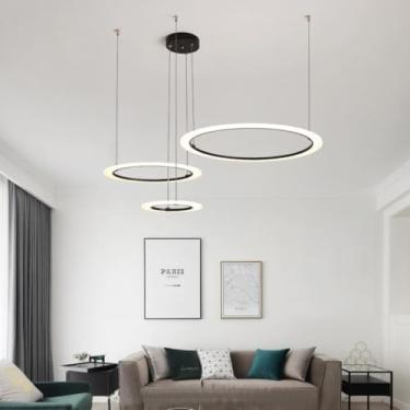 Imagem de Lustre moderno de 4 anéis pretos com LED, dimerizável e controle remoto, luminária pendente ajustável para teto, ideal para sala de estar, cozinha, sala de jantar e quarto (60+80 cm).