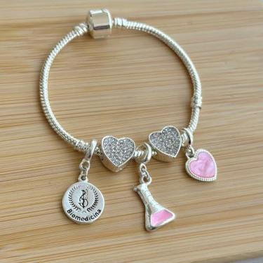 Imagem de Pulseira profissão com 5 berloques: biomedicina, erlenmeyer rosa, separador de brilhos e coração rosa - banhado a prata