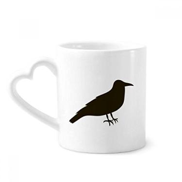 Imagem de Caneca de café de cerâmica com desenho de corvo preto fofo copo de coração de vidro