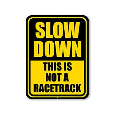 Imagem de Honey Dew Gifts, Slow Down, This is not a Racetrack, Slow Down Sign, Street Signs, Tin Outdoor Sign, Yard Decor, Please Slow Down Sign, 23 cm x 30 cm, HDG-1333