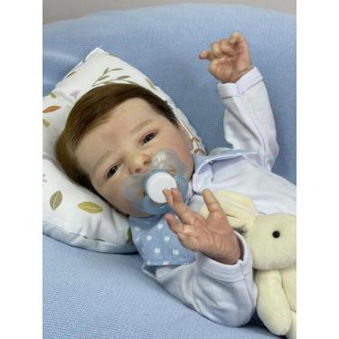 Imagem de Bebê Reborn Menino Aticus Realista Corpo de Tecido Olhos Azuis Cabelo 