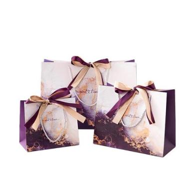 Imagem de Conjunto de sacolas de presente em mármore dourado roxo com alças de f