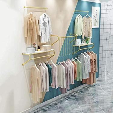 Imagem de Prateleiras De Exibição De Roupas Para Lojas De Roupas Ficam Douradas, Prateleiras De Roupas Montadas Na Parede, Prateleiras De Janela, Cabide Decorativo Na Parede, Poste De Exibição De Roupas De