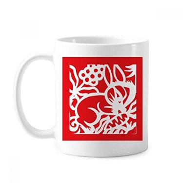 Imagem de Caneca de cerâmica do zodíaco de porcelana de café com corte de papel e coelhos