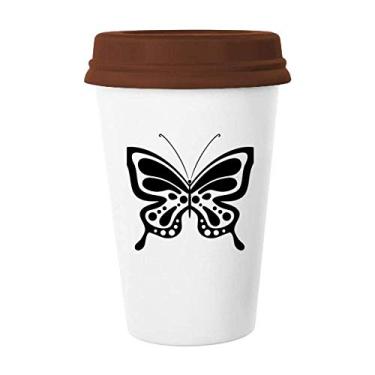 Imagem de Caneca de cerâmica preta com desenho simples de borboleta, caneca de café de vidro bebendo cerâmica