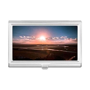 Imagem de Carteira vermelha céu, nuvens escuras, porta-cartões