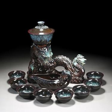 Imagem de Conjunto de chá chinês Gongfu – Bule de cerâmica com infusor, 8 xícaras, design de dragão semiautomático para chá de folhas soltas
