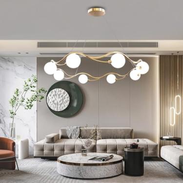 Imagem de Lustre Sputnik moderno dourado com 8 lâmpadas, altura ajustável, em metal dourado com cúpulas brancas, ideal para sala de estar, sala de jantar e lavabo.