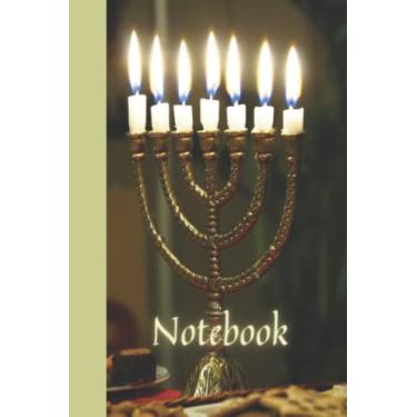 Imagem de MENORAH NOTEBOOK: This lovely notebook/journal features a lit Menorah and would make a beautiful gift.