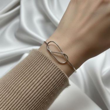 Imagem de Bracelete em Aço Inox Infinito - AMME & CO. BRASIL