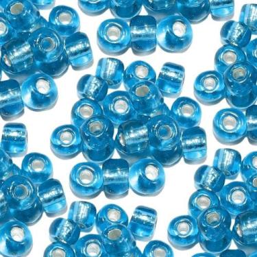 Imagem de Pacote com 50 gramas miçangão azul claro cristal - CASA FÉ