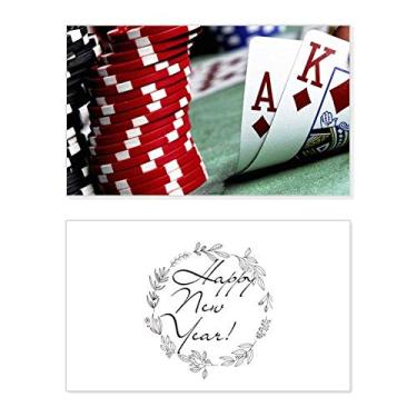 Imagem de Fichas de foto para jogos de pôquer espalhadas no festival de ano novo, cartão de felicitações, mensagem de abençoar presente