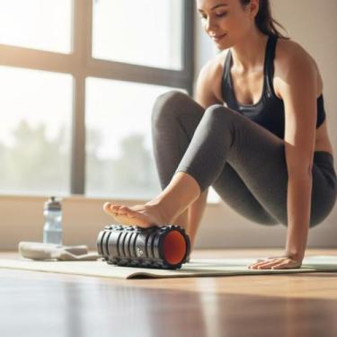 Imagem de Rolo de Liberação Miofascial Preto e Laranja 33x14cm EVA Massageador C