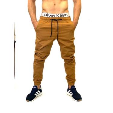 Imagem de calça jeans jogger masculina jeans rasgado, sarja com elastico e bolso