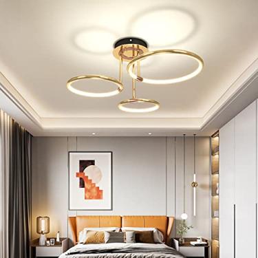 Imagem de Luminária de teto LED com design criativo em formato de anel dourado, regulável, com controle remoto, ideal para sala de estar, quarto, escritório e sala de jantar (3 anéis).