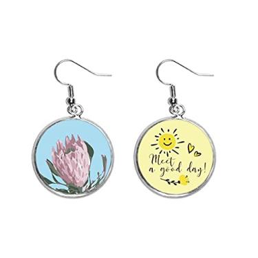 Imagem de Brinco de flor de sol brasileiro com caranguejo peludo; joia moderna