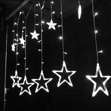 Imagem de As decorações de Natal levaram pequenas lanternas estrela de cinco pontas, feriado, luzes de néon de
