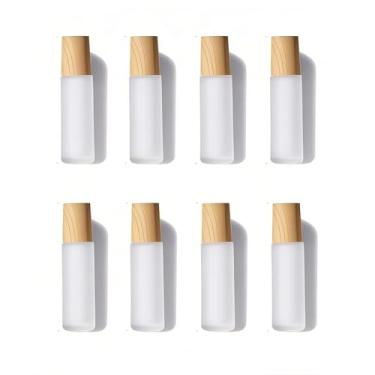 Imagem de Doromy 8 pacotes de garrafas de vidro recarregáveis de 10 ml, recipiente fosco comestic com tampas de madeira, rolo de óleo essencial, garrafas de rolo portáteis com esferas de aço inoxidável para