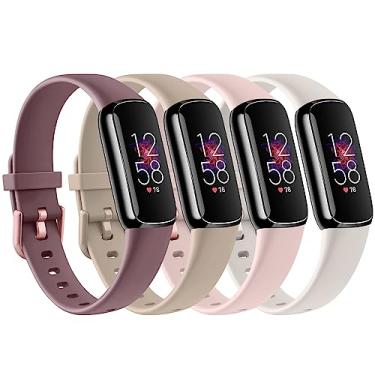 Imagem de Pacote com 4 pulseiras esportivas compatíveis com Fitbit Luxe para mulheres e homens, pulseiras esportivas de substituição de silicone macio para Fitbit Luxe Fitness e rastreador de bem-estar (rosa claro/luz das estrelas/violeta fumaça/chá de leite, pequeno)