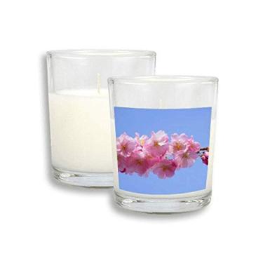 Imagem de Cera de incenso perfumada de vidro com lindas flores rosa céu azul