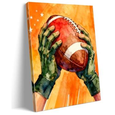 Imagem de Arte de parede de futebol americano em aquarela emoldurada - 30 x 40 cm, mãos segurando futebol, impressão em tela motivacional para fãs de esportes, decoração de sala de jogos de caverna masculina