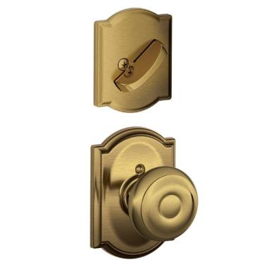 Imagem de Schlage Lock Company F59GEO609CAM Conjunto de puxadores internos georgianos com cilindro único, latão antigo (apenas metade interior)