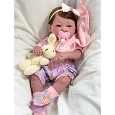 Imagem de Bebê Reborn Menina Realista Mama e Faz Xixi Toma Banho Cabelo Castanho