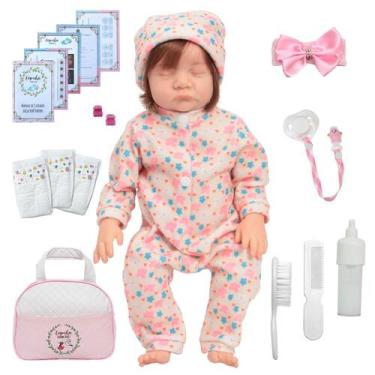 Imagem de Bebê Reborn Lívia Fio a Fio Com Pijma Florido Bolsa E Itens - Cegonha 