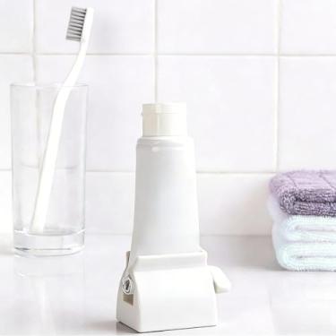 Imagem de Espremedor de pasta de dente rolante - uma maneira fácil e higiênica de distribuir pasta de dente! (1BRANCO)