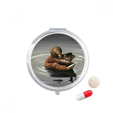 Imagem de Caixa de comprimidos para fotografia de animal com organismo de cisne e bolso para remédios