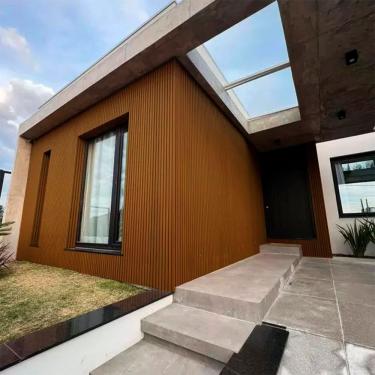 Imagem de Painel Ripado Externo Em Wpc 21,9cmx2,6cmx290cm Teak A