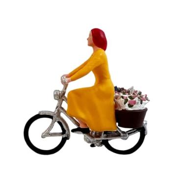 Imagem de Dynwave Miniatura de de vestido amarelo em escala 1/64, modelo de ciclista feminina, para dioramas colecionáveis, ideal para decoração de mesa.