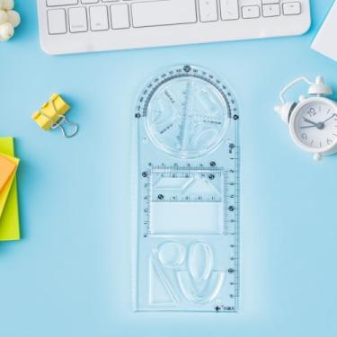 Imagem de Régua de desenho geométrico multiuso para estudantes - plástico transparente, 14 formas, transferidor e ferramentas de medição embutidas - leve e durável, 21,7 x 8,4 cm