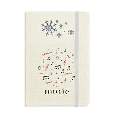 Imagem de Caderno de notas musicais vermelho e preto com flocos de neve para inverno