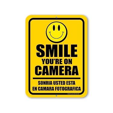 Imagem de Honey Dew Gifts, Smile You're On Camera, 22,88 cm x 30,5 cm, placas bilíngues em inglês espanhol, placa de segurança espanhol, placa de aviso de câmera de segurança, placa de vigilância por vídeo,