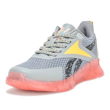 Imagem de Reebok Tênis infantil unissex infantil de renda elástica Zig N' Glow, Cinza/laranja/amarelo, 10.5 Little Kid