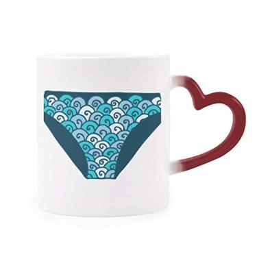 Imagem de Calção de banho azul, estampa de ilustração sensível ao calor, caneca vermelha que muda de cor