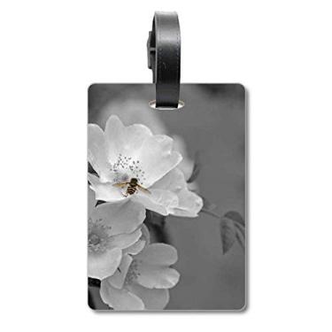 Imagem de Bolsa de mala preta e branca com lindas flores, etiqueta para cartão de bagagem