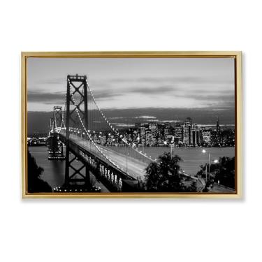 Imagem de Stupell Industries Arte de parede em tela flutuante emoldurada dourada com luzes da ponte da cidade à noite por Danita Delimont, 25 x 17