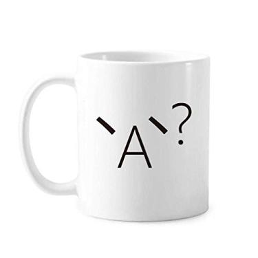 Imagem de Caneca de cerâmica com expressão enigmática de cerâmica xícara de café e porcelana