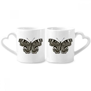 Imagem de Borboleta com asa escura conjunto de canecas de porcelana para casais, coração e coração