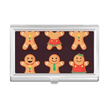 Imagem de Biscoito de gengibre masculino com porta-cartões de Natal e porta-cartões
