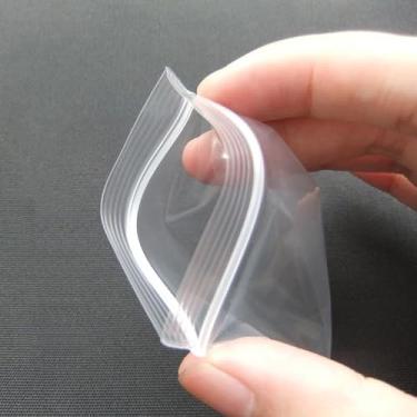 Imagem de Pacote com 100 sacos de joias transparentes, zíper autovedante, tamanhos variados para embalagem e armazenamento de joias