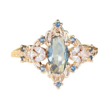 Imagem de Anel De Noivado Vintage Feminino Com Pedra Oval Dourada E Cristal Azul