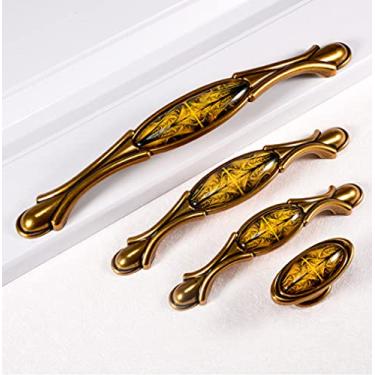 Imagem de Puxadores e puxadores para móveis retrô elegante em bronze vintage para cozinha.
