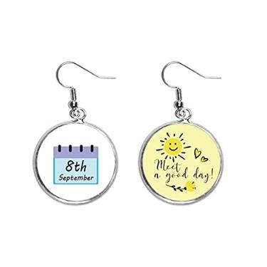 Imagem de Brinco de flor de sol com descrinação do dia da alfabetização internacional joia moderna